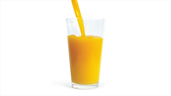 Orange Juice Poured Into Glass