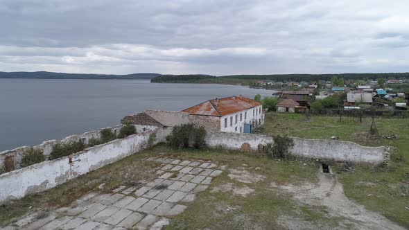 Aerial view of old brick ruined building and school 09