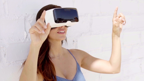 Young Woman Wearing Virtual Reality Glasses