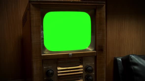 Old Retro TV with Green Screen. Sepia Tone. Zoom In.