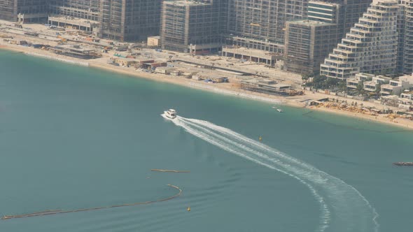 The Boat Floats Along the Coast of Dubai