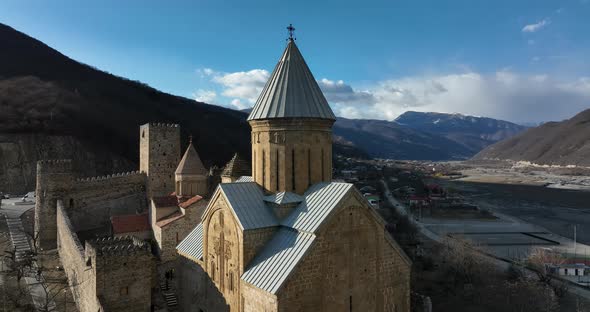 Aerial view of old Ananuri Fortress with two churches and picturesque view on river. Georgia 2022