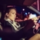 Beautiful Girl With a Phone In The Car - VideoHive Item for Sale
