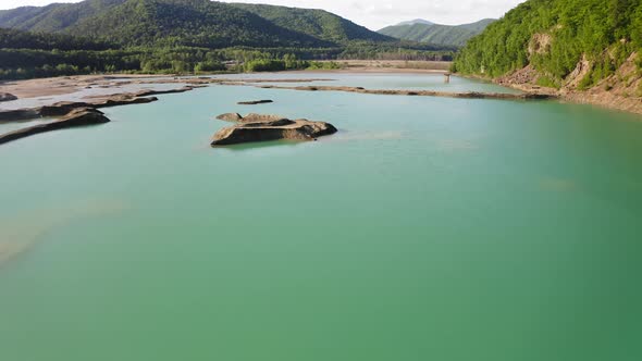 Drone View of the Turquoise Lake Formed As a Result of Mining Waste