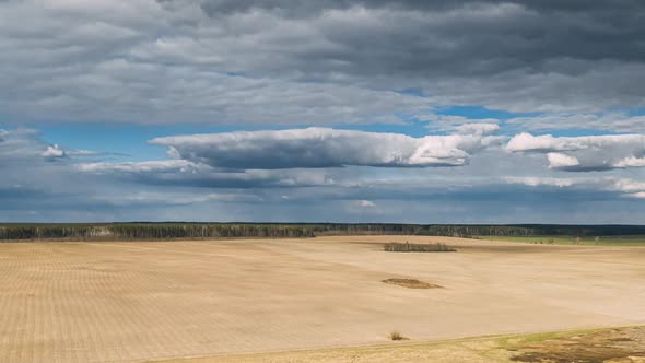 Early Spring Countryside Rural Field Landscape In Spring Cloudy Day