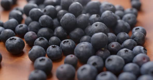 Stack of blueberry on wooden plate