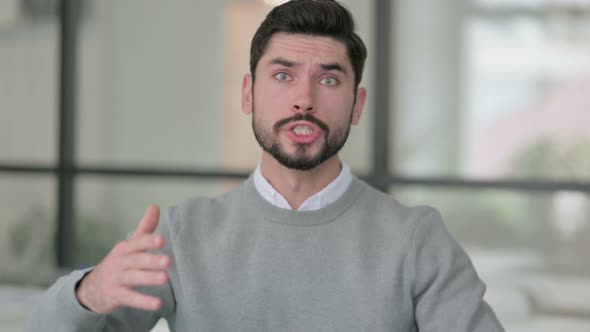 Portrait of Angry Young Man Fighting Arguing