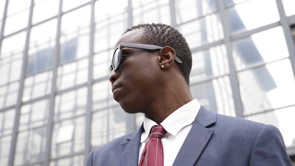 African Business Man with Sunglasses in The City