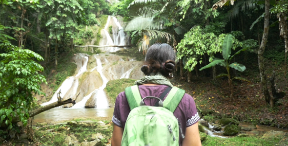 Woman Walking, Waterfall At Background