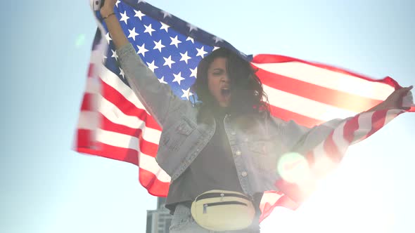 Angry Young African Woman Stand Hold Usa Flag Shouting Protesting Outdoors