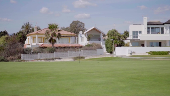Luxury Homes Surrounding Flat Golf Course Range