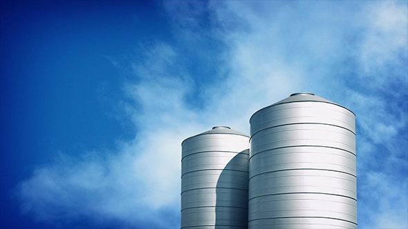 Large Silos On Sunny Day