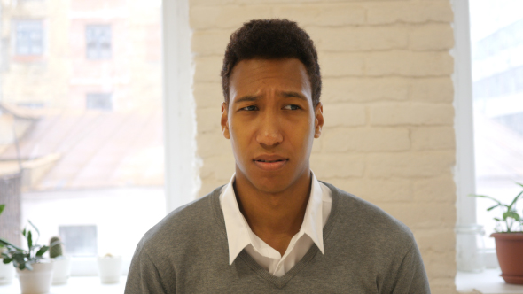 Confused Young Black Man, Portrait