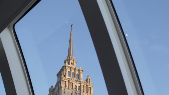 Spire Of The Building Through The Porthole alt
