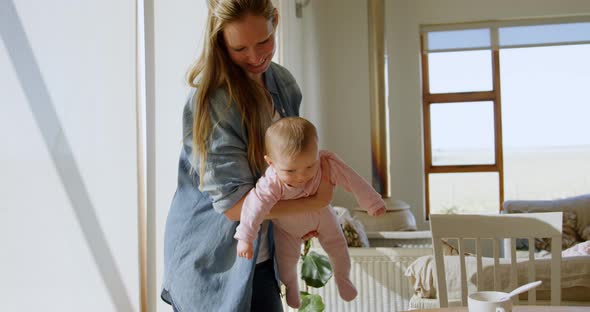 Mother playing with her baby boy 4k