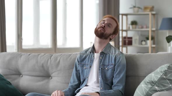 Young Beard Man Waking From Sleep in Shock