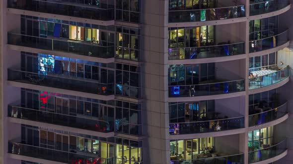 Night View of Exterior Apartment Colorful Building Timelapse with Windows