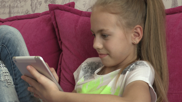 Young Girl Using Tablet At Home 05