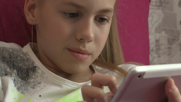 Young Girl Using Tablet At Home 06