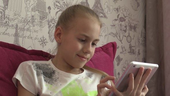 Young Girl Using Tablet At Home 07