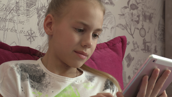 Young Girl Using Tablet At Home 08