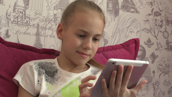 Young Girl Using Tablet At Home 09