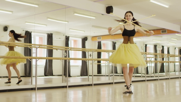 Girl Wearing Costume With Corset Is Dancing