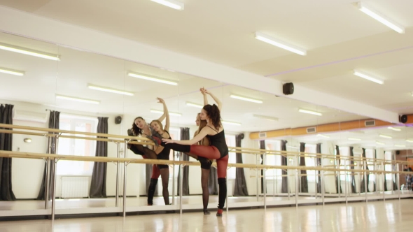 Beautiful Girl Doing Exercises With Girl Instructor