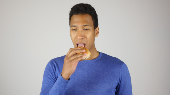 Hungry Man Eating Burger, Taking Bite of Burger