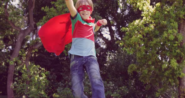 Boy Pretending to Be Superhero