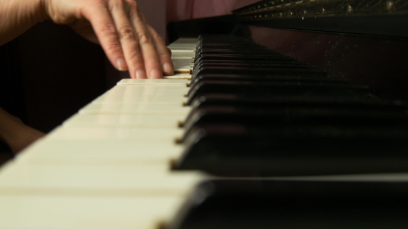 Female Hands Playing a Gentle Piece Of Classical Music On a Beautiful Grand Piano