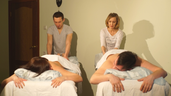 Man And Woman Doing Couples Massage