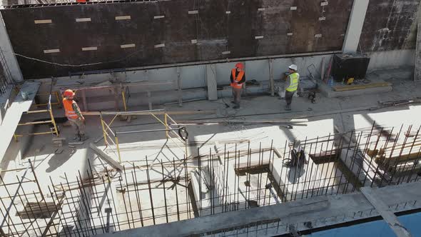 Large Construction Site of Residential Building with Workers