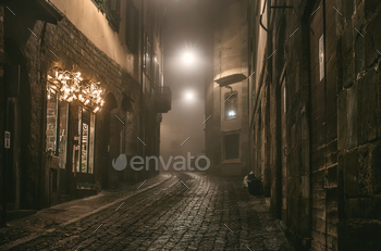 Old European narrow empty street of medieval town