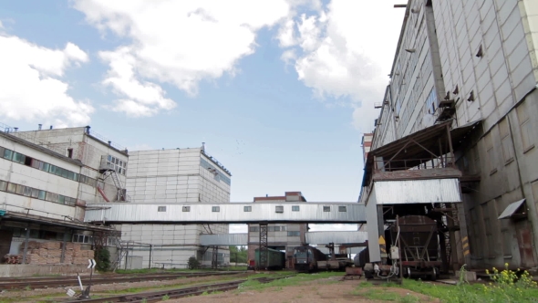 Train With Cargo Carriages In Industry Plant