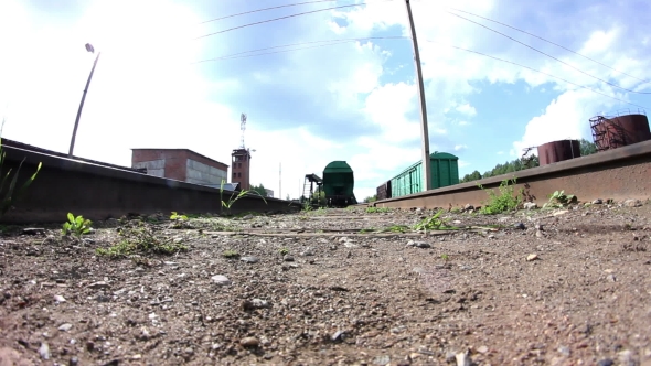 Passing Cargo Train In Industrial Plant