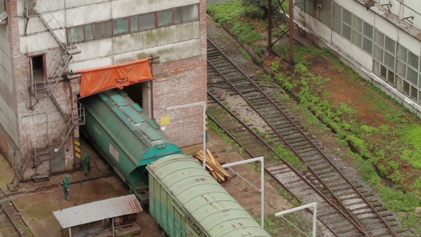 Passing Cargo Train In Industrial Plant