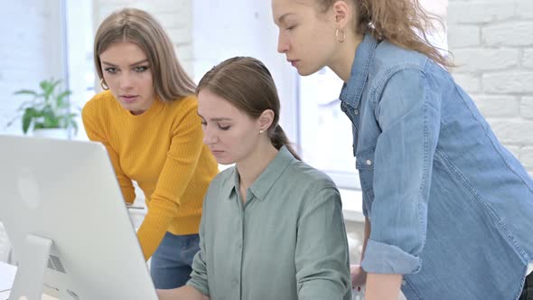 Hardworking Women Startup Team Working on Desktop