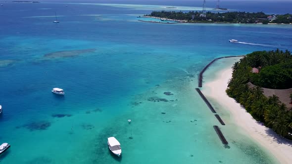 Aerial drone travel of tropical island beach by blue ocean and sand background