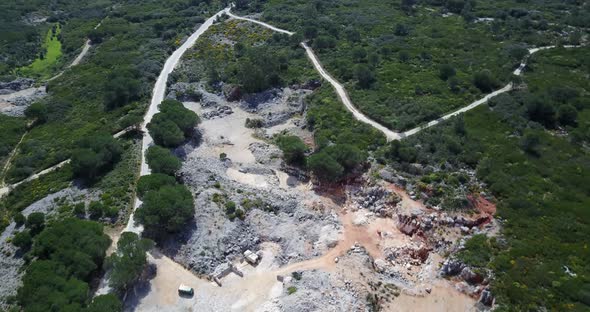 Tilt up from an Aerial shot of Parque Natural de las Sierras de Aire y Candeeiros