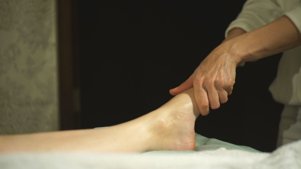 Pregnant Woman Doing Foot Massage