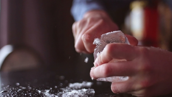 Bartender Mannually Crushed Ice With Wooden Metal Knife.