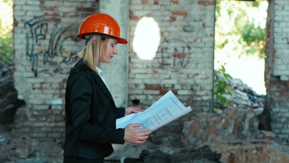 Architect Builder Engineer Builder Of Ruined Building Looking Girl Work Plan For The Construction