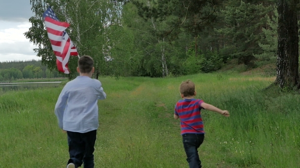 Back View Children Running With The US Flag