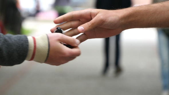 Male Hands Giving The Keys To Car To His Friend.