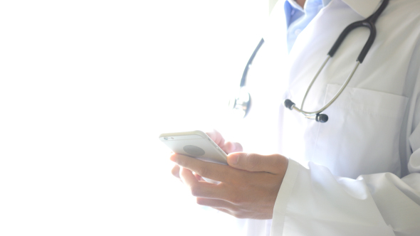 Doctor Helping Patient Online, Using Smartphone