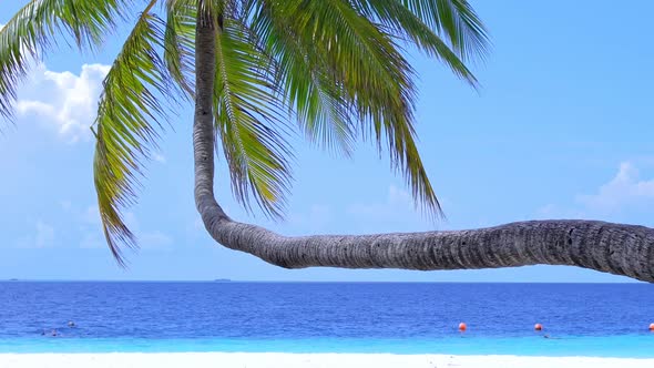 Tropical Island at Maldivian Atoll in Indian Ocean