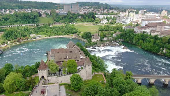 Flying over Laufen Castle (German: Schloss Laufen) at Rhine Falls in Switzerland