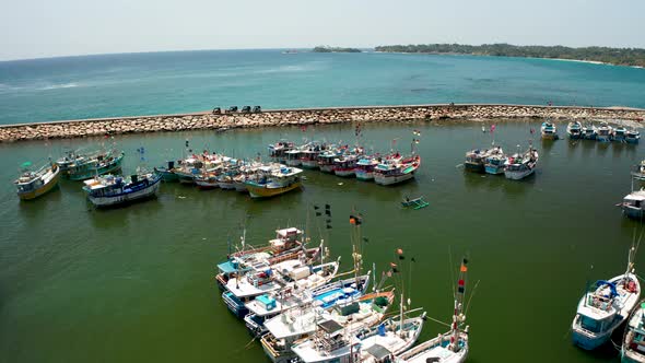 View of Fishing Boats in a Small Bay in the South of the Island of Sri Lanka. Aerial View