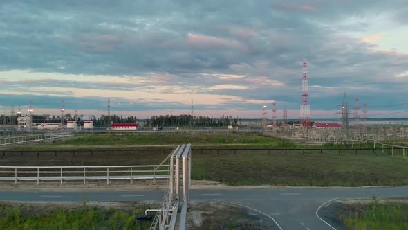 A Drone Flies Over the Pipes of a Gas Pipeline in an Oil and Gas Field